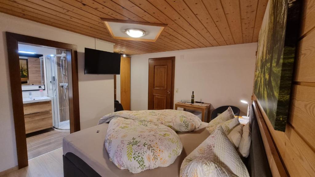 Postel nebo postele na pokoji v ubytování Haus Seebach