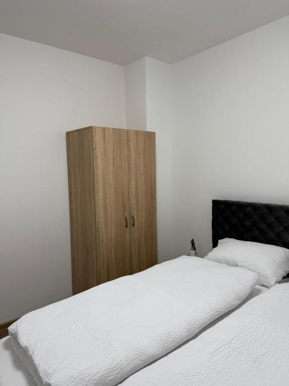 Postel nebo postele na pokoji v ubytování Biljana Apartmani