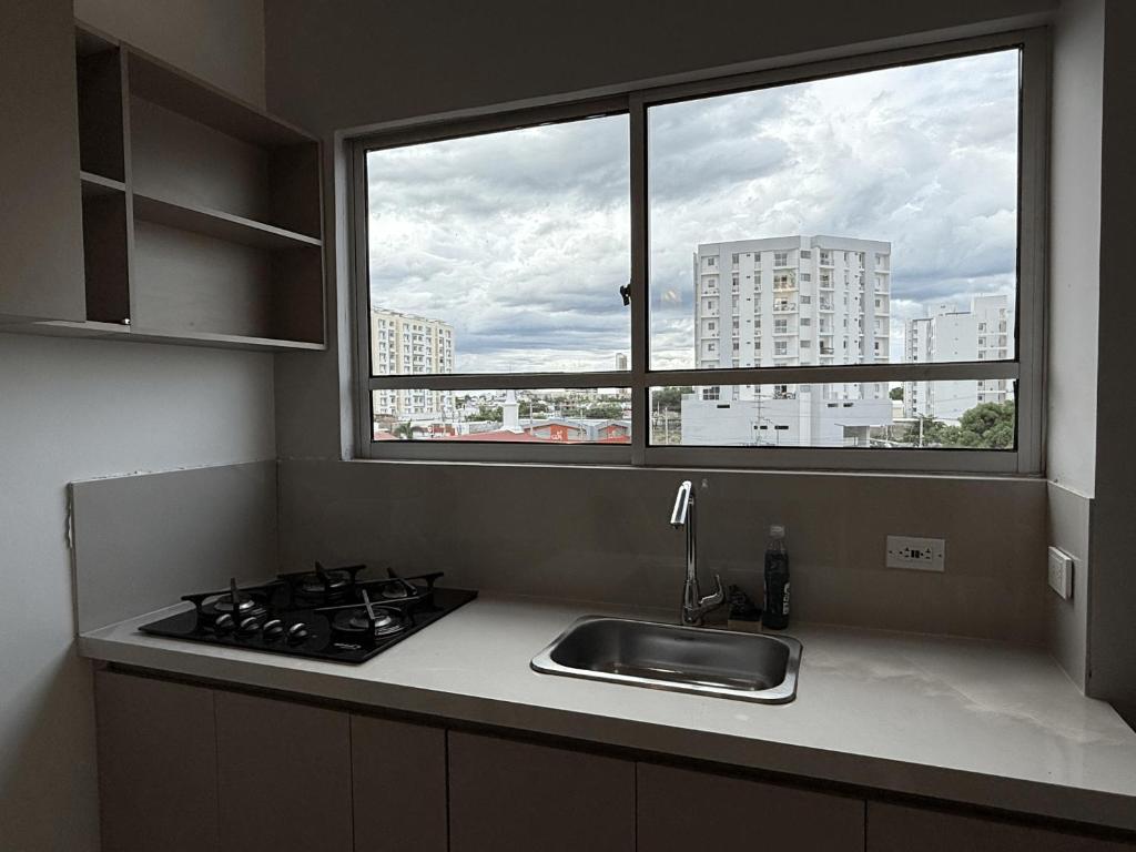 Kuchyň nebo kuchyňský kout v ubytování Lindo Apartamento con Jacuzzi en Monteria