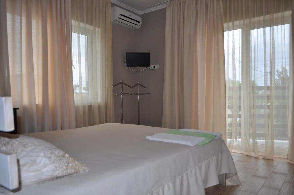 Postel nebo postele na pokoji v ubytování Inn Estio