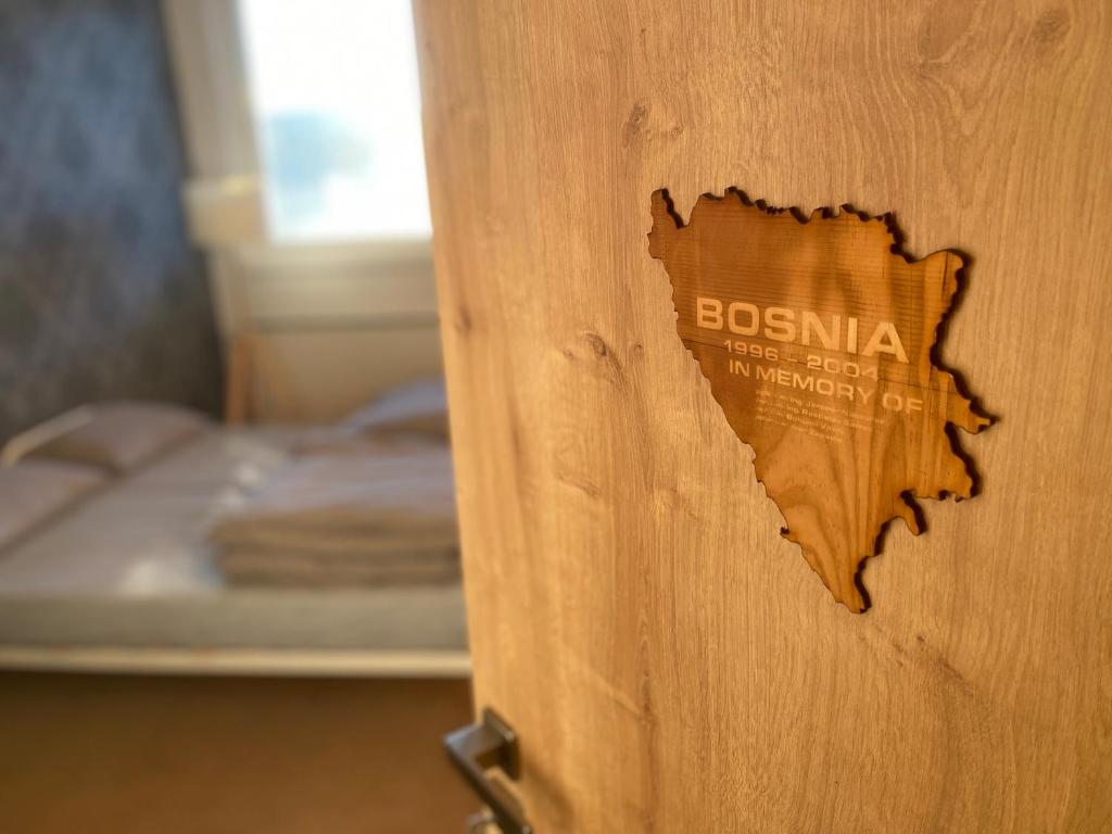 Postel nebo postele na pokoji v ubytování ELITE Heroes