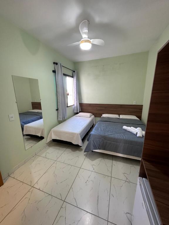Postel nebo postele na pokoji v ubytování Pousada STL