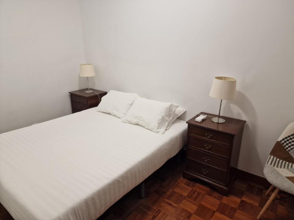 Postel nebo postele na pokoji v ubytování Funchal Downtown Flats 2