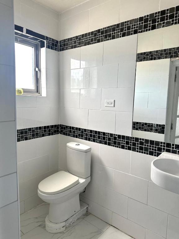 Koupelna v ubytování ShkyBlue Suites