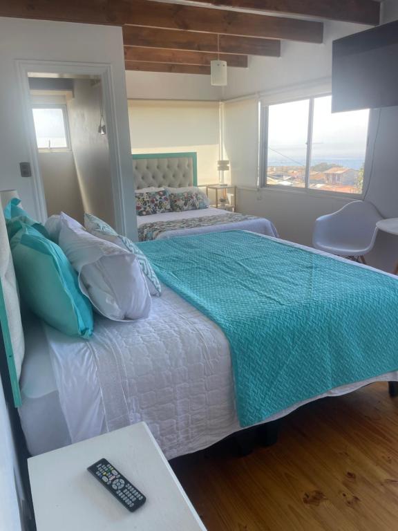 Postel nebo postele na pokoji v ubytování Hostal Napoli