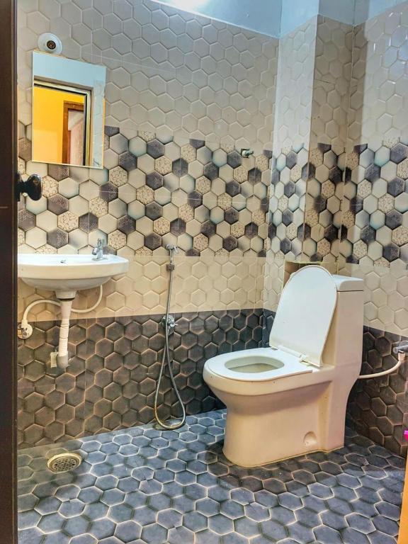 Koupelna v ubytování ROSEPARK INN