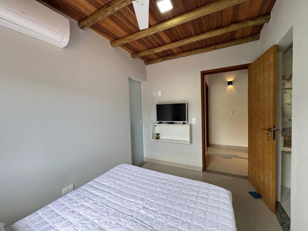 Et tv og/eller underholdning på Recanto do Paraíso