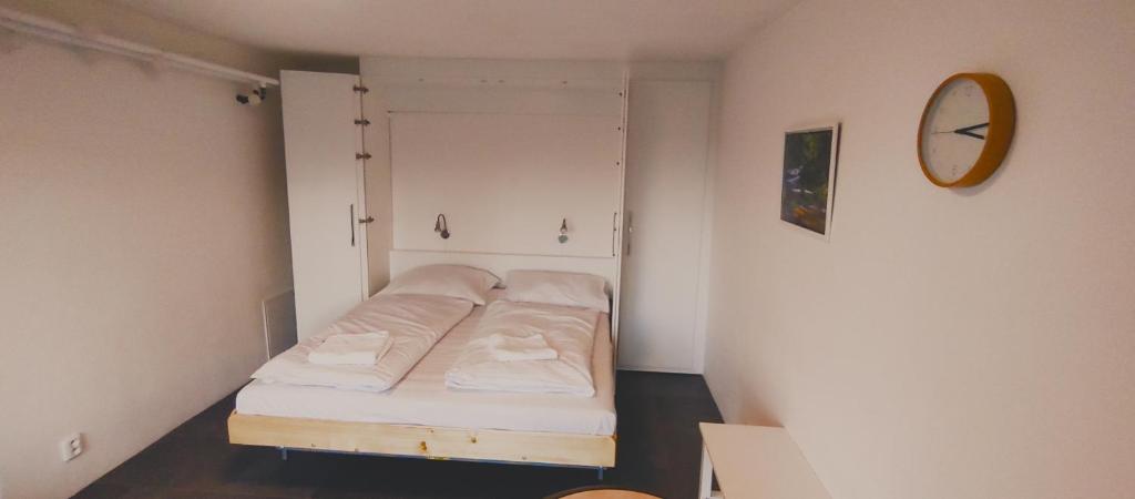 Postel nebo postele na pokoji v ubytování Apartmány Pěkná 10