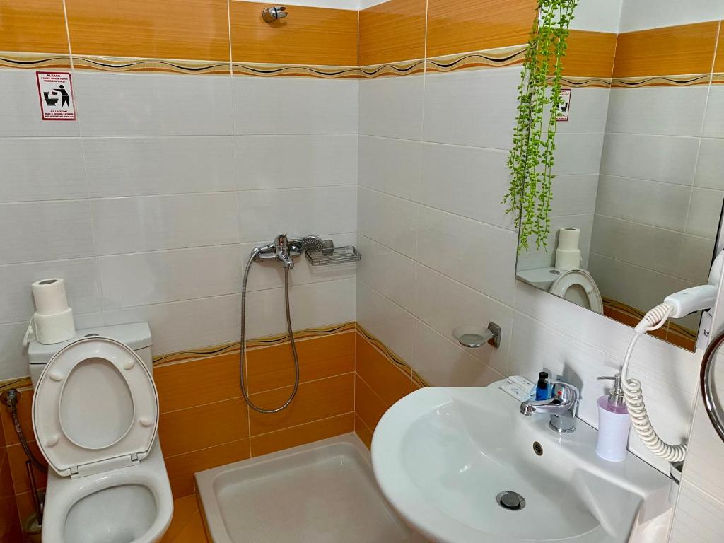 Koupelna v ubytování Hotel Metali