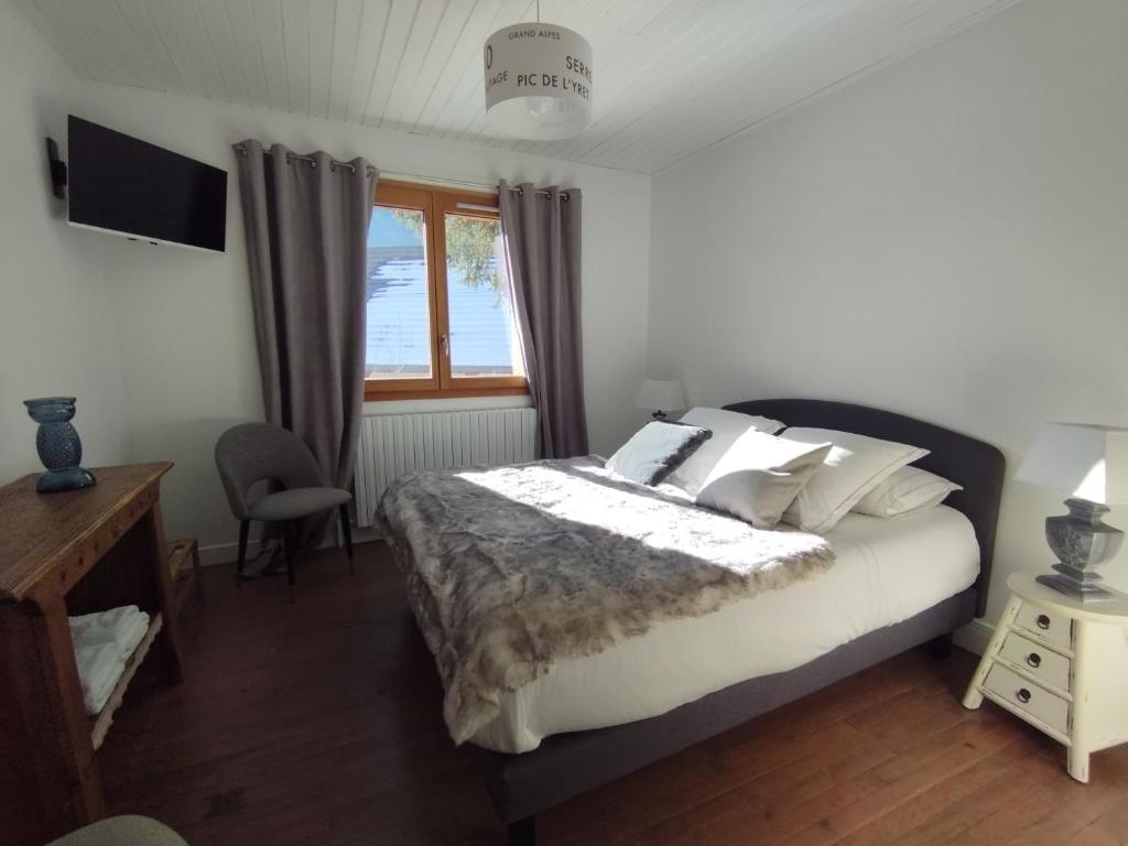 Postel nebo postele na pokoji v ubytování La Terrasse des Ecrins