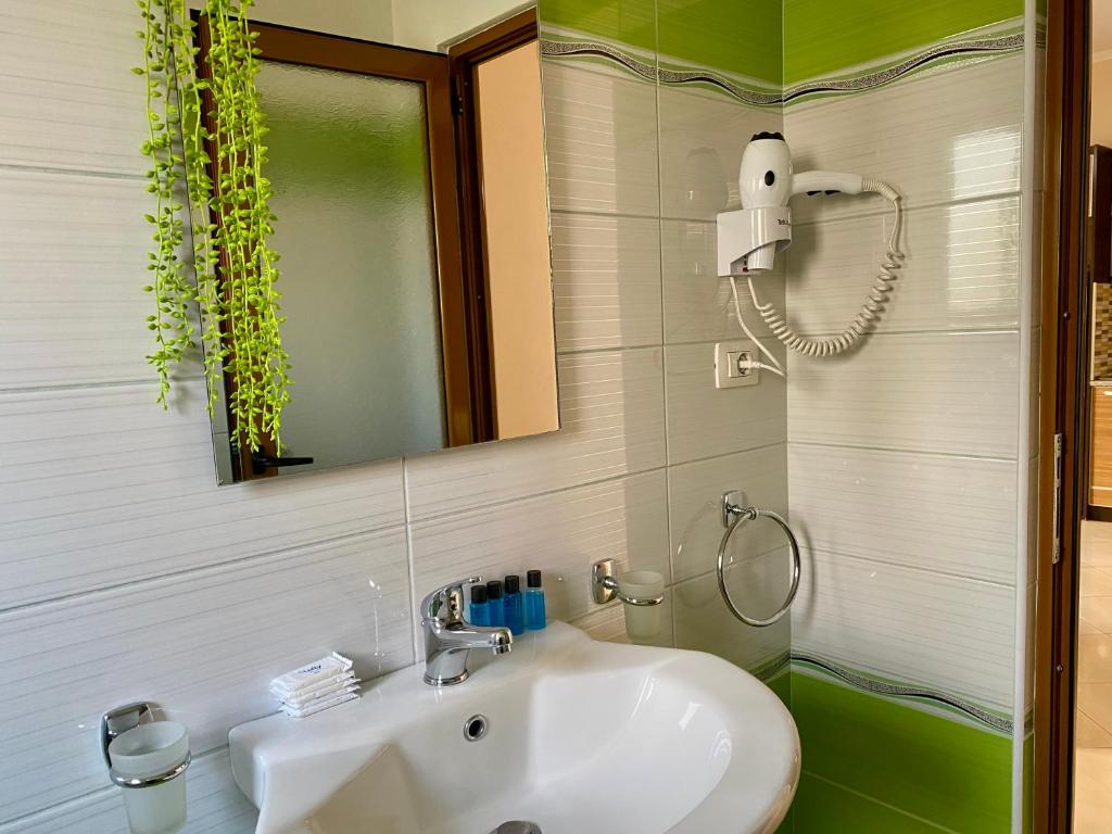 Koupelna v ubytování Hotel Metali