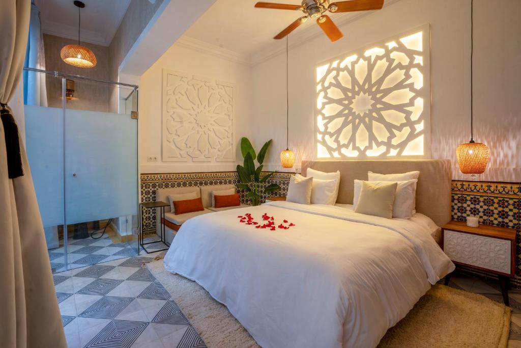 Postel nebo postele na pokoji v ubytování Maison H Kasbah