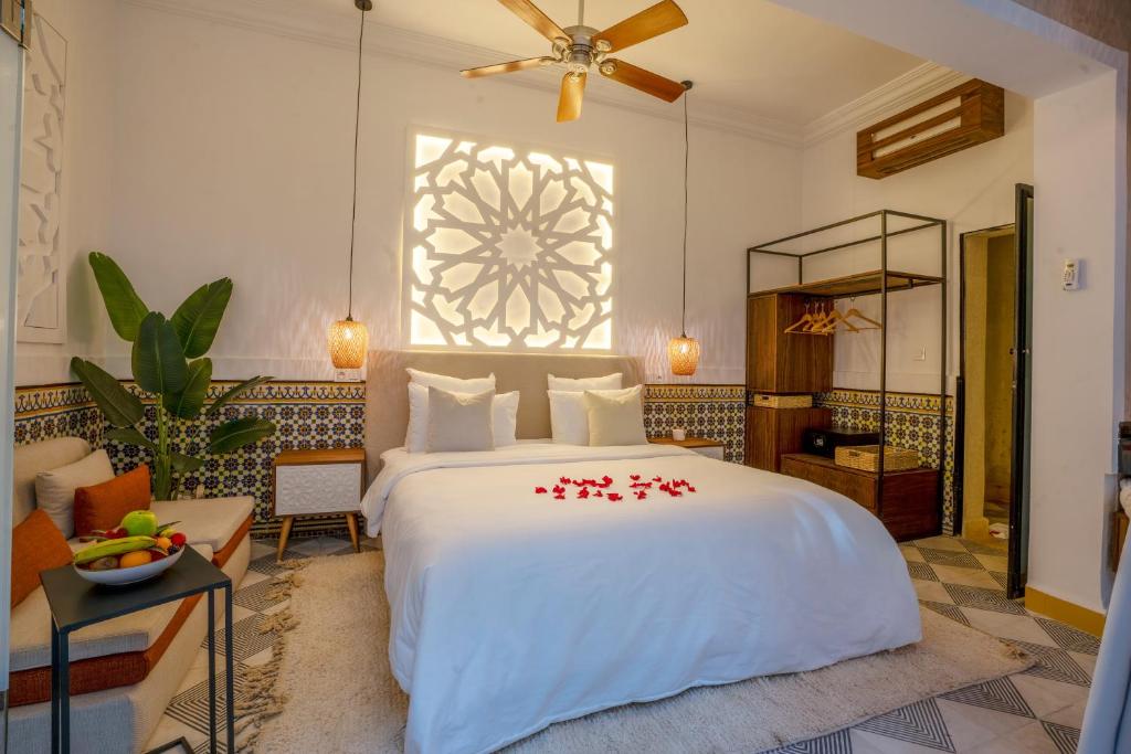 Postel nebo postele na pokoji v ubytování Maison H Kasbah