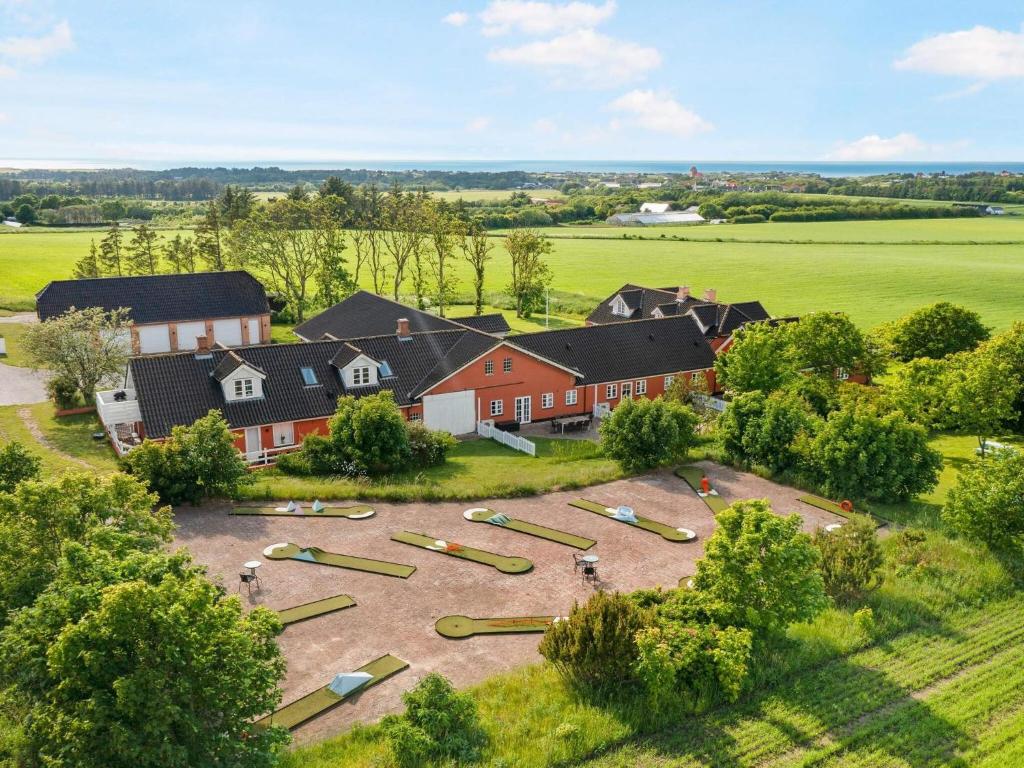 an aerial view of a house with a playground at Charming Seaside Escape - By Traum Ferienwohnungen in Hjørring