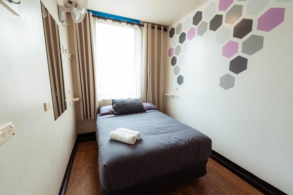 Postel nebo postele na pokoji v ubytování Flinders Backpackers