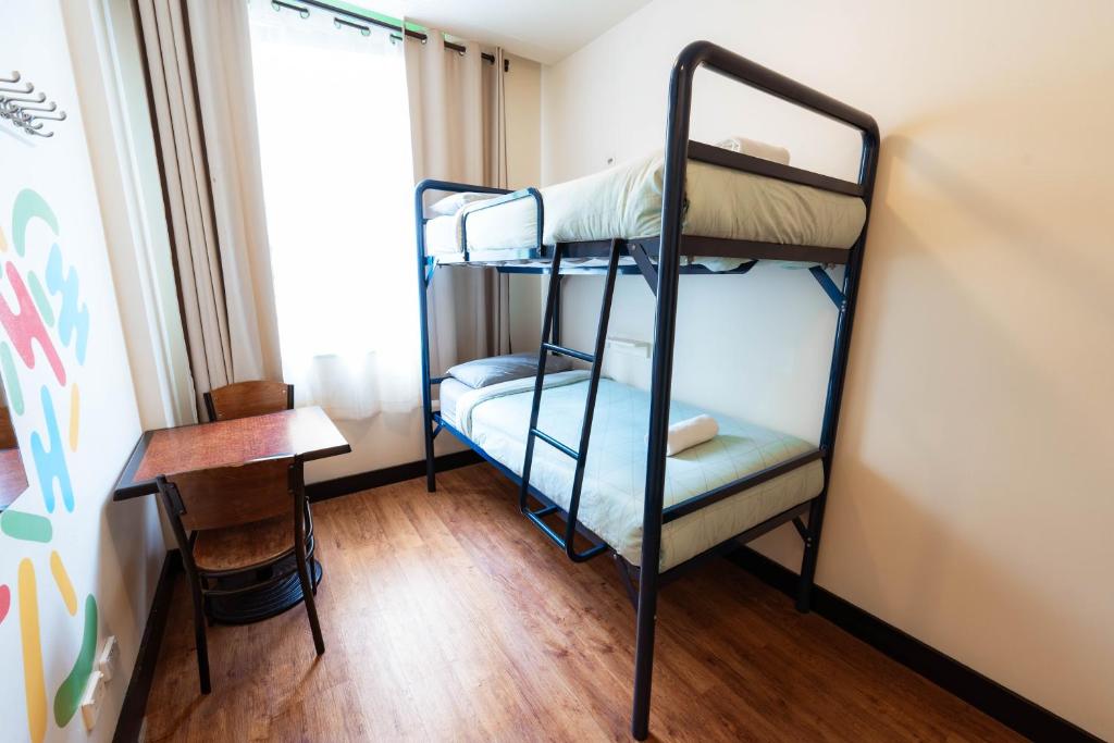 Postel nebo postele na pokoji v ubytování Flinders Backpackers