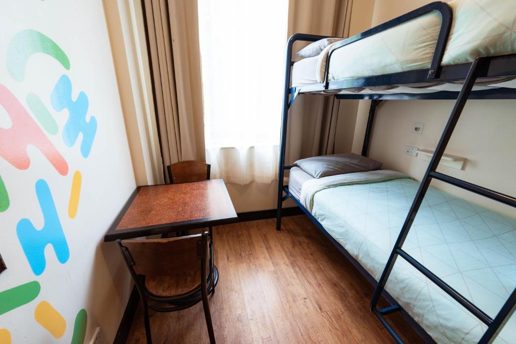 Postel nebo postele na pokoji v ubytování Flinders Backpackers