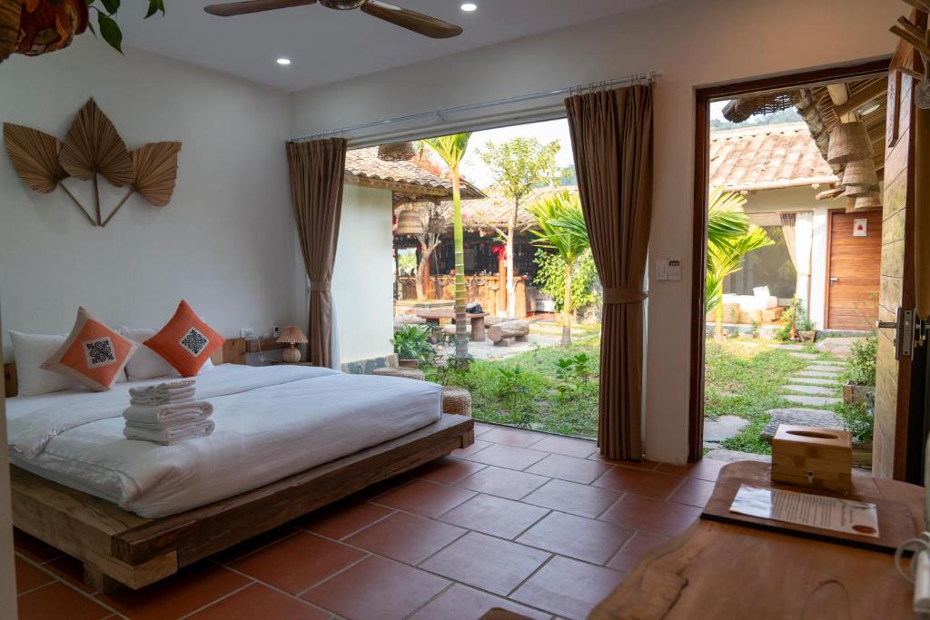 Giường trong phòng chung tại Anans Home Ha Giang - Tours &amp; Motorbike Rental