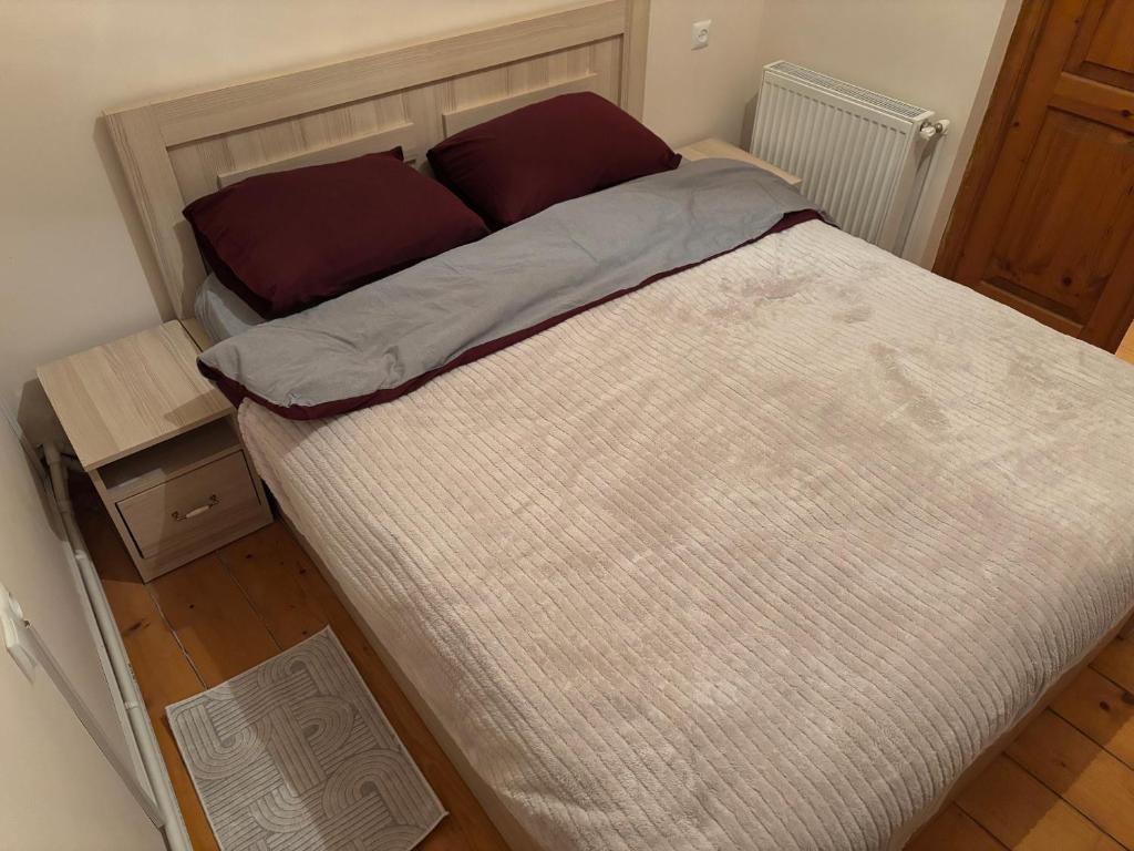 Postel nebo postele na pokoji v ubytování Mirzahouse