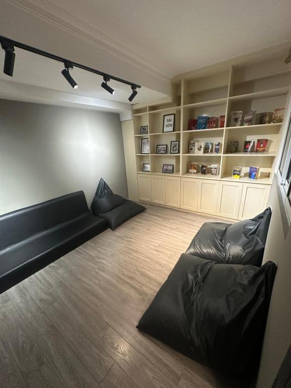 Posezení v ubytování Triple Hostel
