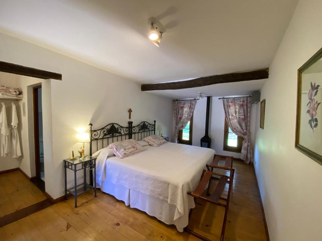 Postel nebo postele na pokoji v ubytování Las Vertientes hotel boutique