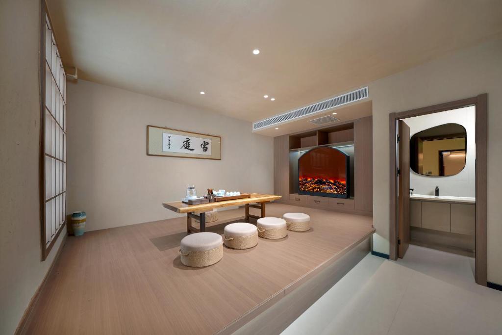 Fotografie z fotogalerie ubytování Xueting Songjiangyue Hidden Courtyard Hotel v destinaci Charbin