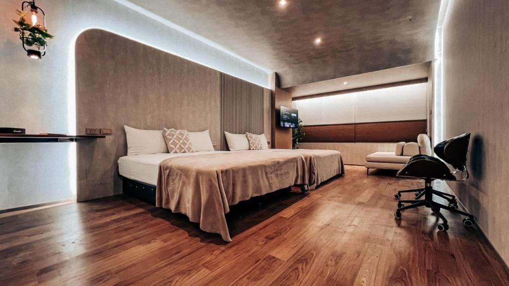 Postel nebo postele na pokoji v ubytování Urban Abode Apartment 1