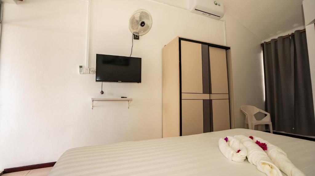 Postel nebo postele na pokoji v ubytování La Plage Residence