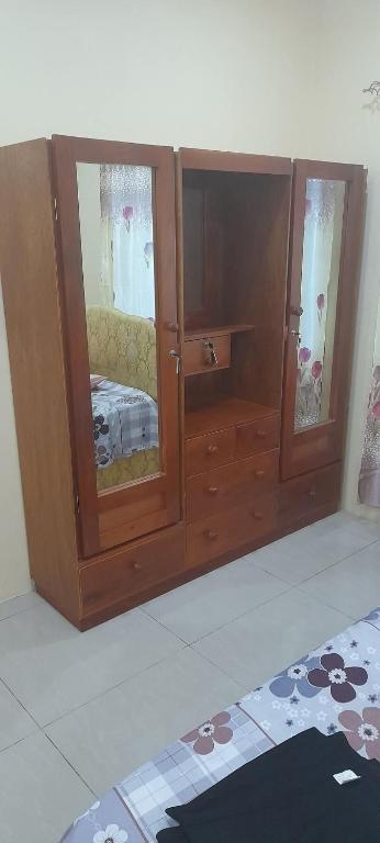Postel nebo postele na pokoji v ubytování Hasmatullah Holiday Apartments