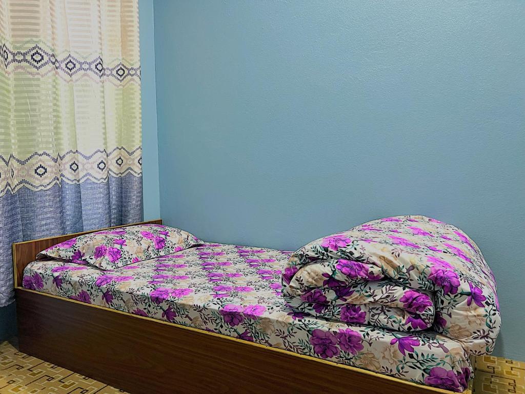 Postel nebo postele na pokoji v ubytování Hotel Maidi Khadgadevi