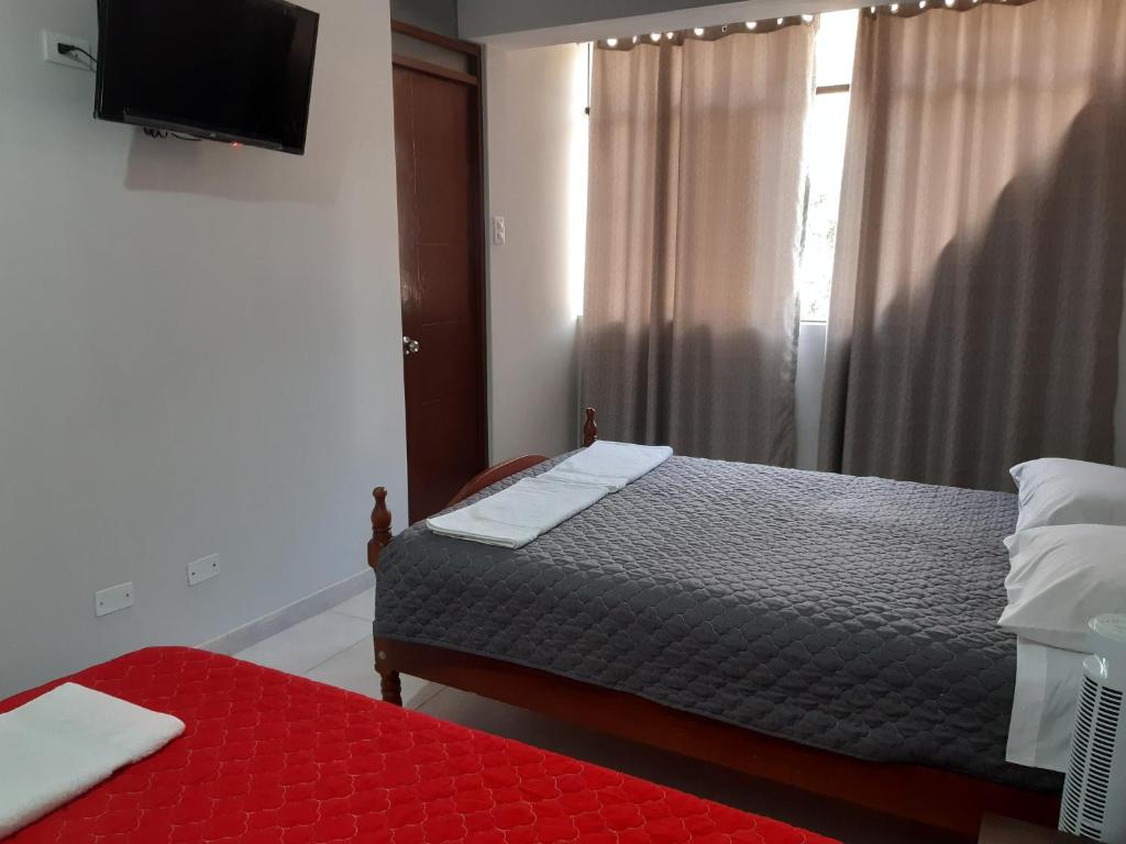 Postel nebo postele na pokoji v ubytování El Valle Lunahuaná