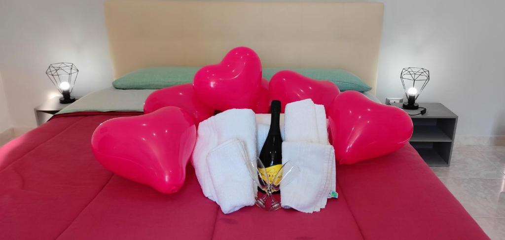 Giường trong phòng chung tại Petit Bijou