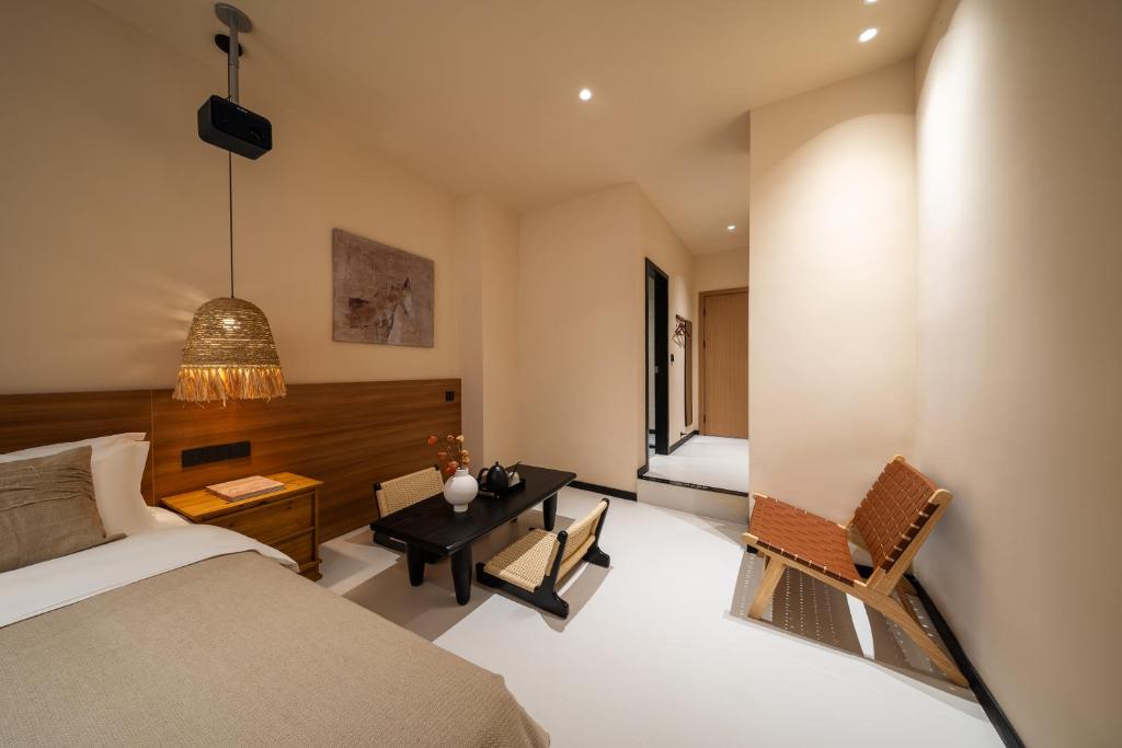 Postel nebo postele na pokoji v ubytování 厦门椿野酒店