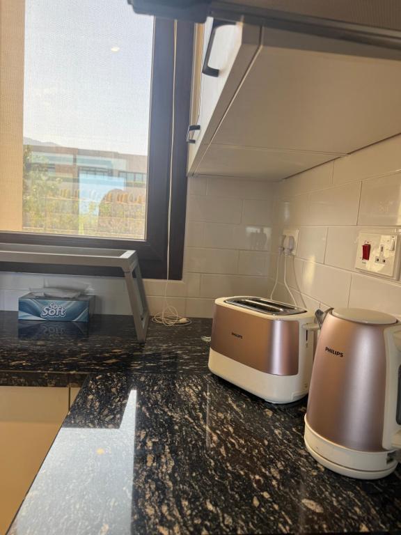 Kuchyň nebo kuchyňský kout v ubytování Beach house بيت البحر