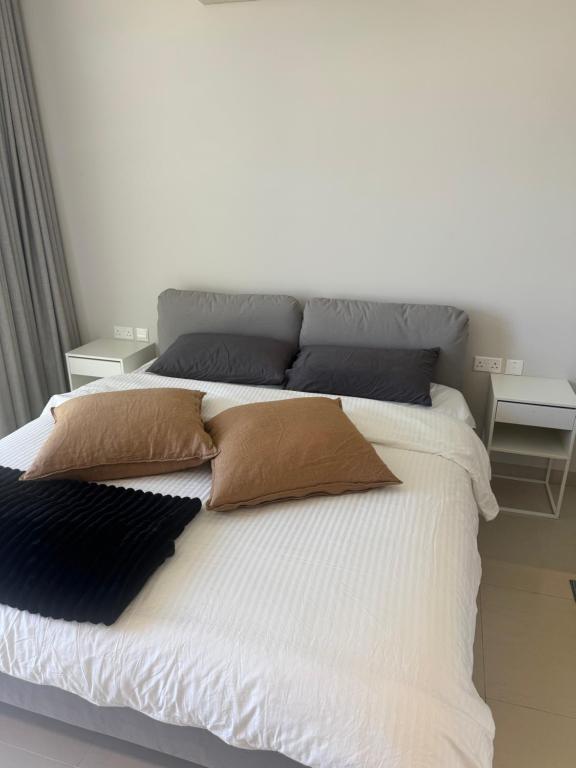Postel nebo postele na pokoji v ubytování Beach house بيت البحر