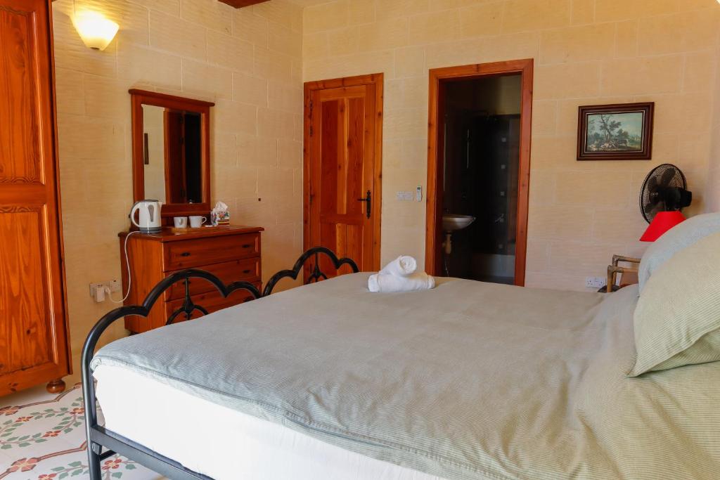 Postel nebo postele na pokoji v ubytování Rosehill B&B