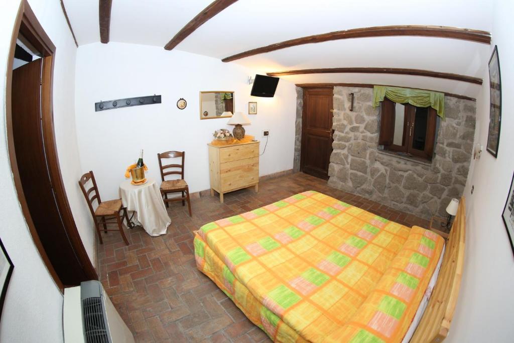 Posteľ alebo postele v izbe v ubytovaní Agriturismo Monte Due Torri
