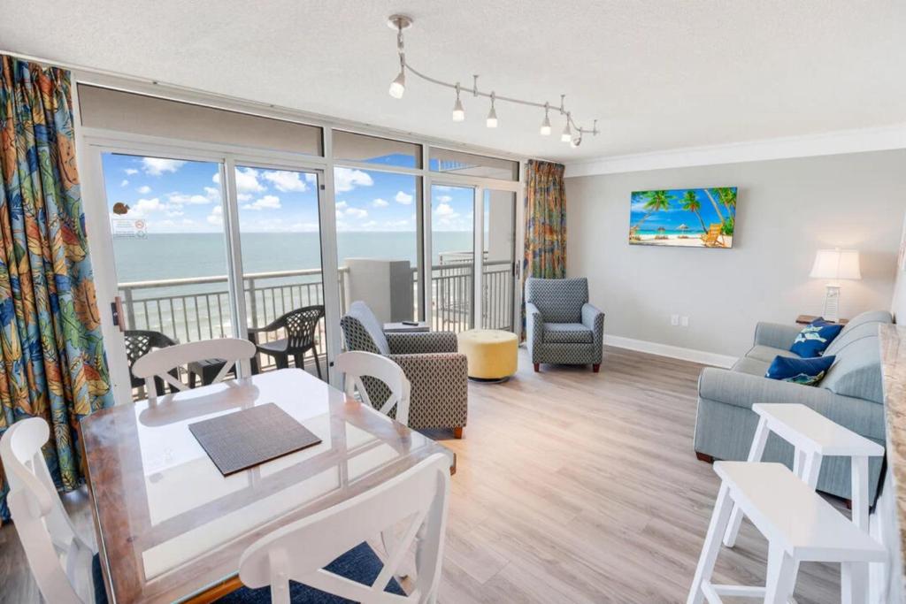 a living room with a view of the ocean at Atlantica 753 in Myrtle Beach