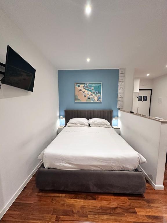 En eller flere senge i et værelse på Dimora PugliaMí