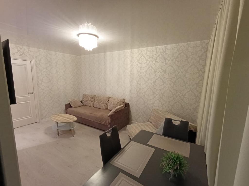 Posezení v ubytování New Comfortable Apartment in center