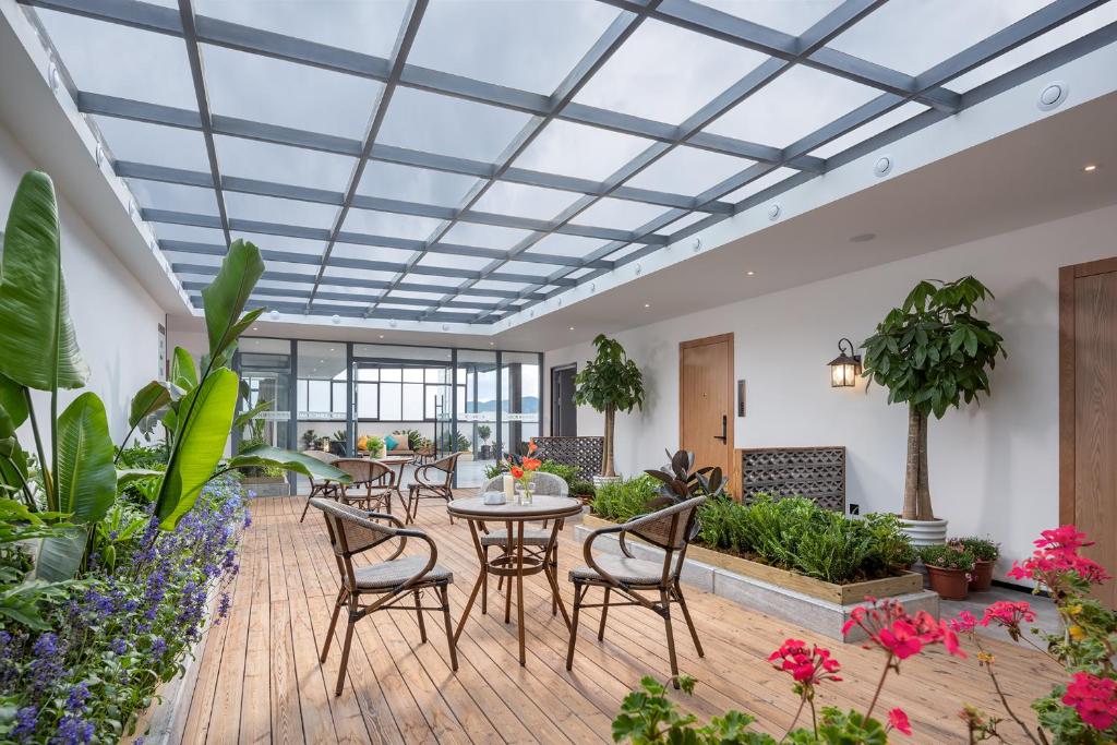 Posezení v ubytování Lijiang MΛISON Hotel