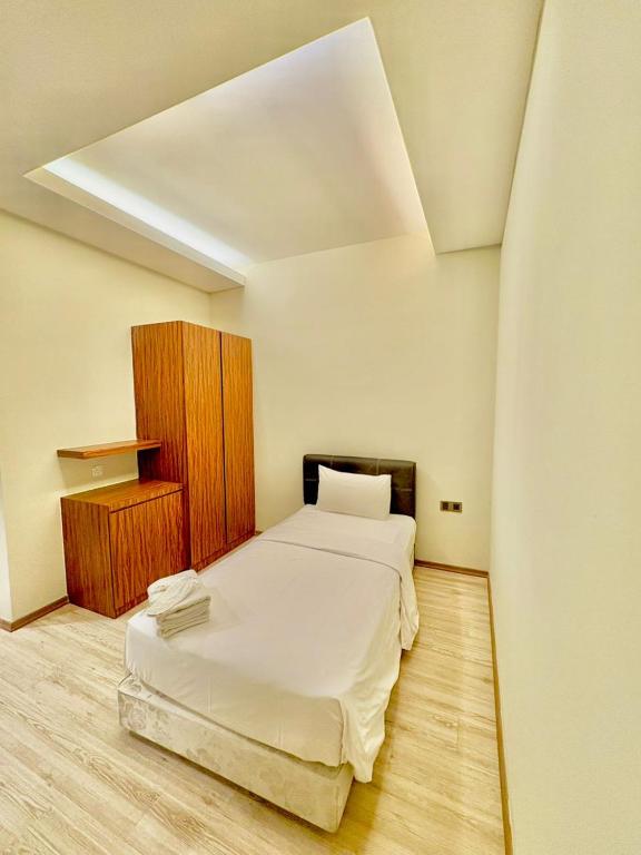 Postel nebo postele na pokoji v ubytování Colors Hotel
