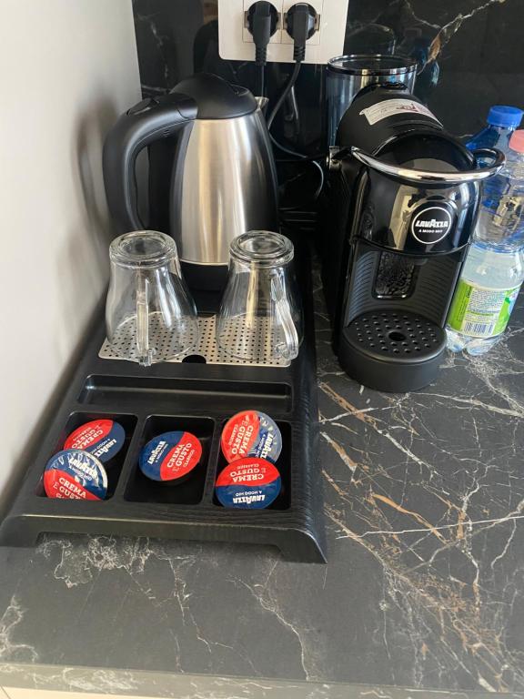 Kuchyň nebo kuchyňský kout v ubytování Apartament Exclusive,vicino metro Bengasi Torino