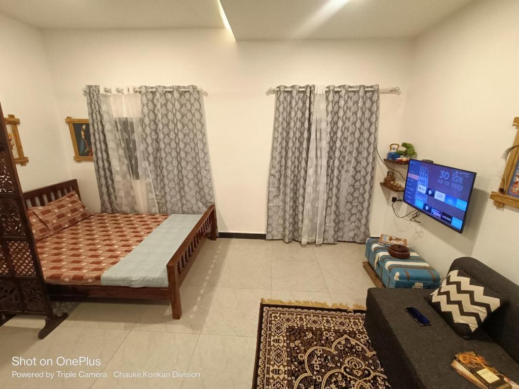 Μια τηλεόραση ή/και κέντρο ψυχαγωγίας στο White Lily home away from home