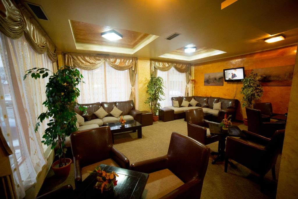TV a/nebo společenská místnost v ubytování Hotel Havana