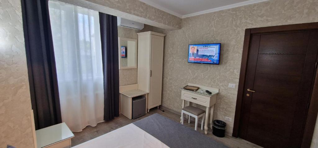 Postel nebo postele na pokoji v ubytování Florian Rooms