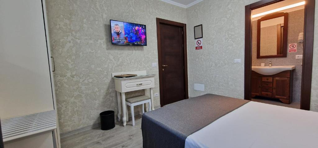 TV a/nebo společenská místnost v ubytování Florian Rooms