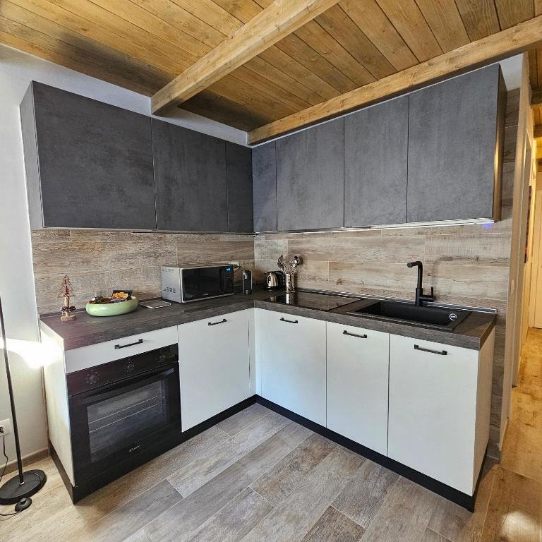 Kuchyňa alebo kuchynka v ubytovaní Moda Apartments Scalette