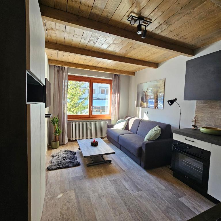 Televízia a/alebo spoločenská miestnosť v ubytovaní Moda Apartments Scalette