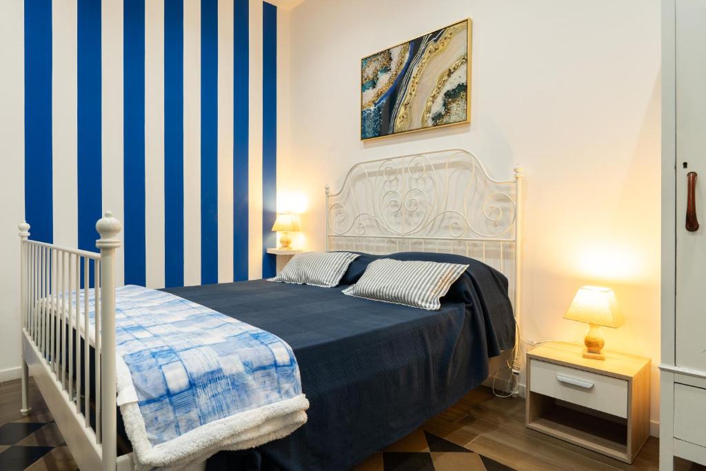 Posteľ alebo postele v izbe v ubytovaní Ortigia Sweet Home